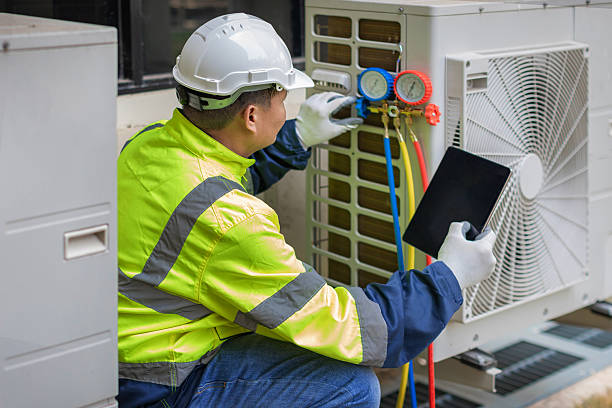 Professional Hvac technician working in Camp Hill, AL